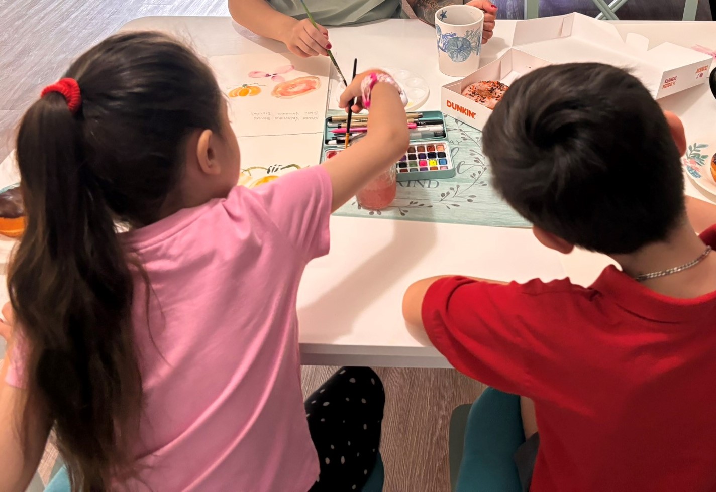 Diana painting with children